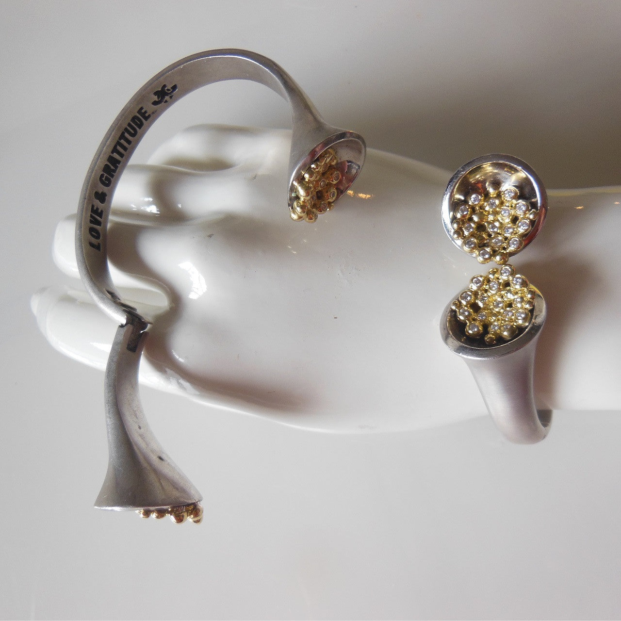 Bowl of Overflowing Diamonds Bracelet. Sterling cuff with 18K gold dots of diamonds