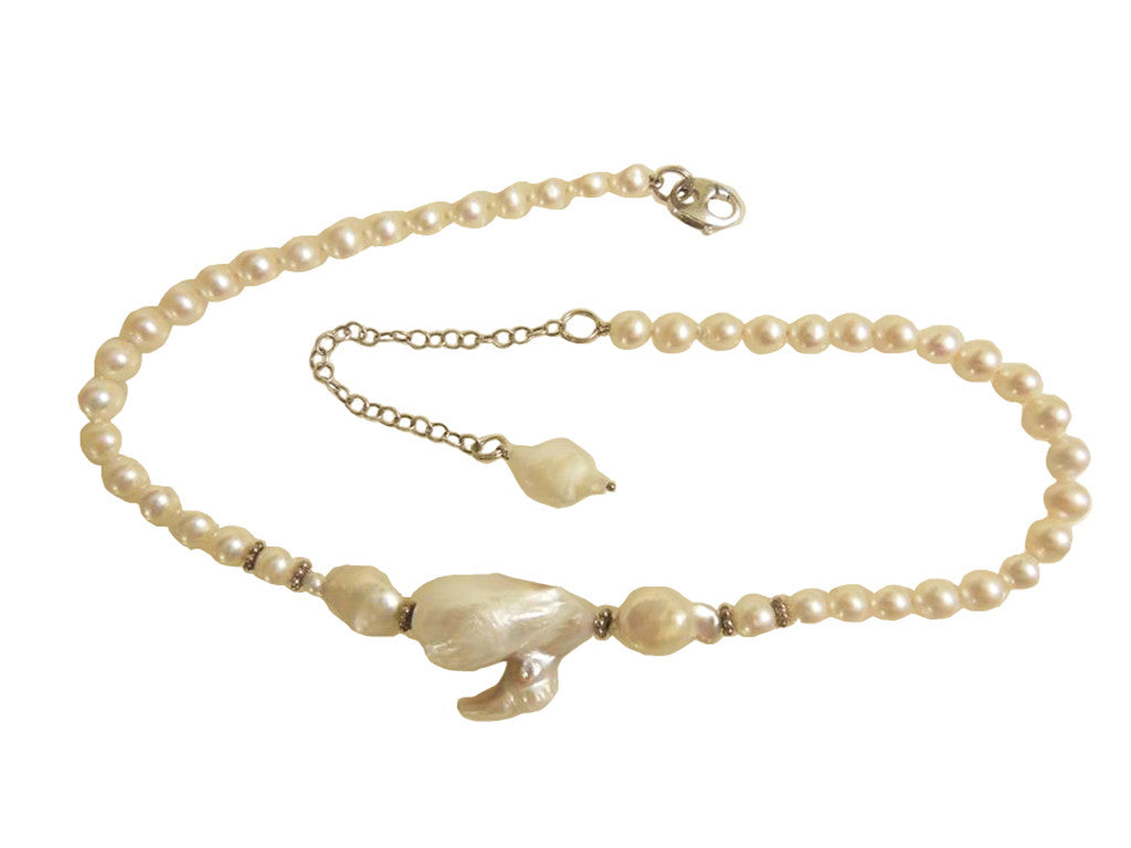 White on white on white. Jumbo baroque on baroque on round Chinese Freshwater Pearls
