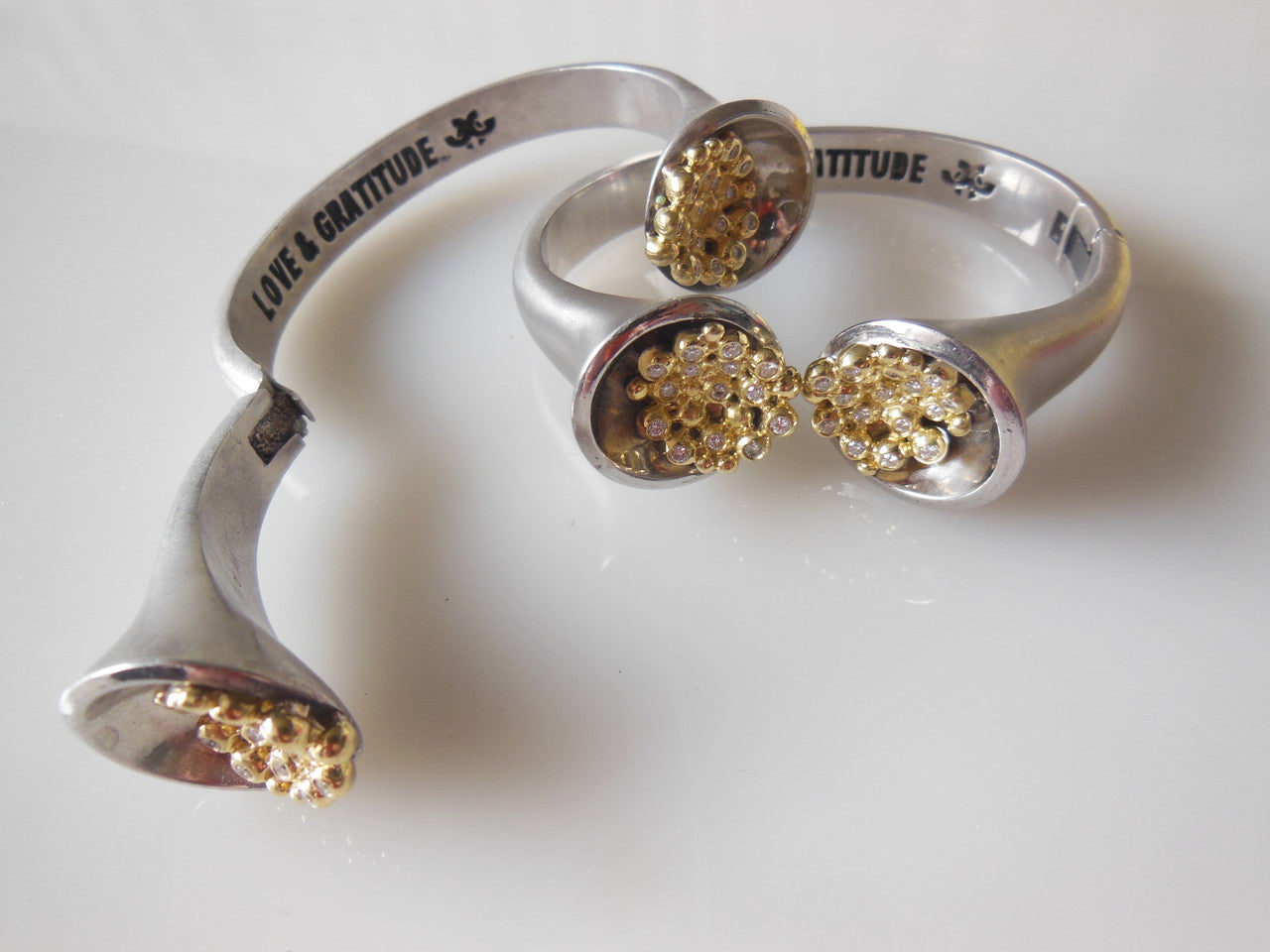 Bowl of Overflowing Diamonds Bracelet. Sterling cuff with 18K gold dots of diamonds