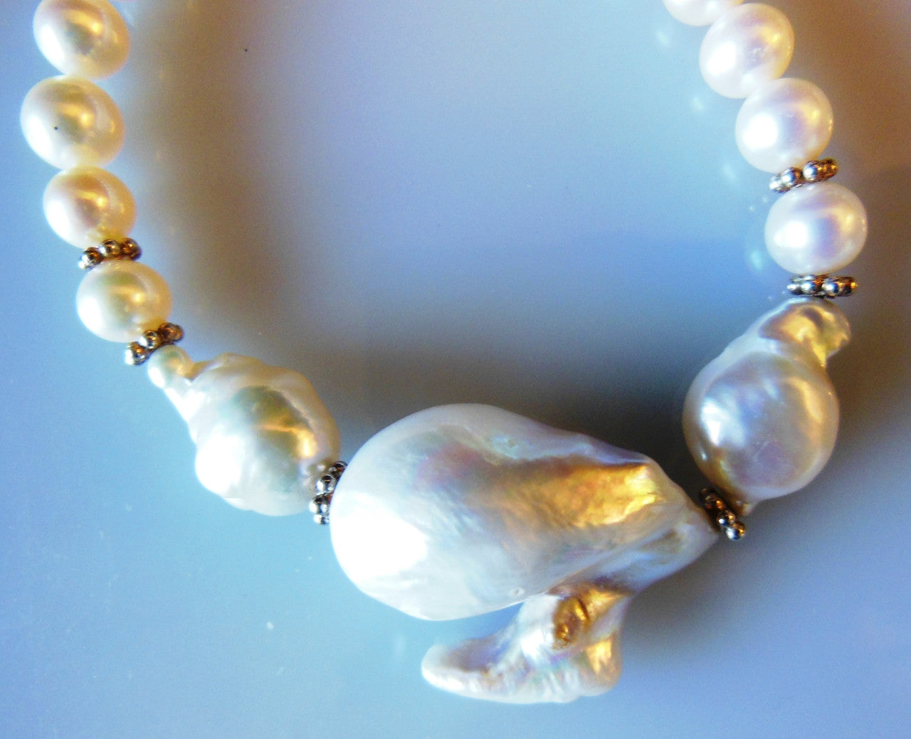 White on white on white.  Jumbo baroque on baroque on round Chinese Freshwater Pearls