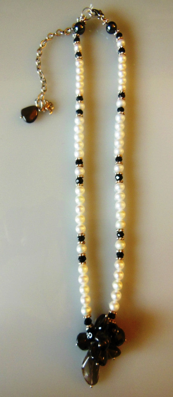 Smoky quartz cluster on white pearls-1
