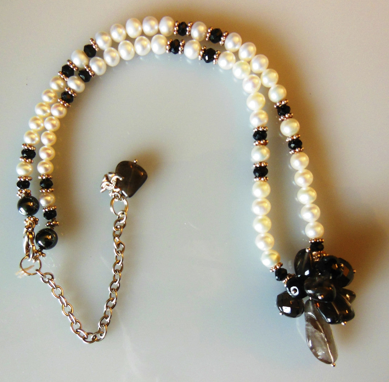 Smoky quartz cluster on white pearls-2