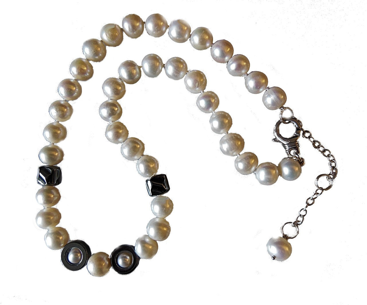 Hematite Circles and asymetric beads on white pearls