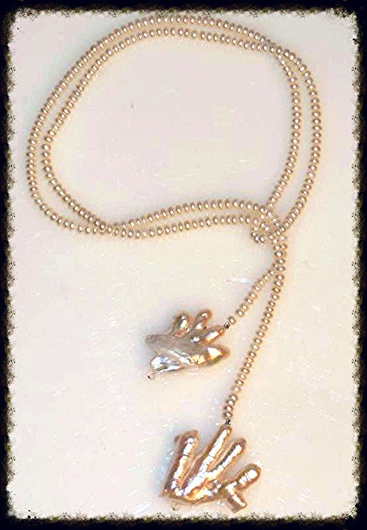 High Five- Two hand shaped pearls on button pearl lariat